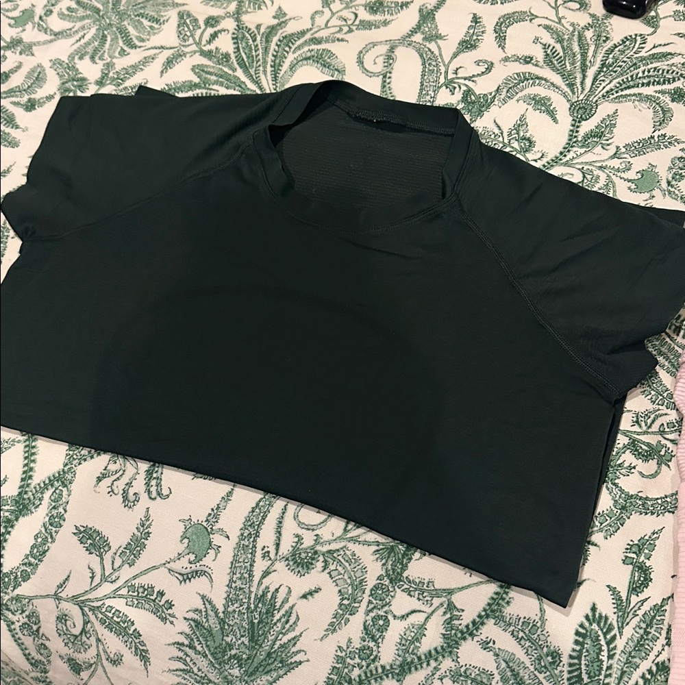 Dark Green lululemon short sleeved, not race length, regular length! Worn twice!